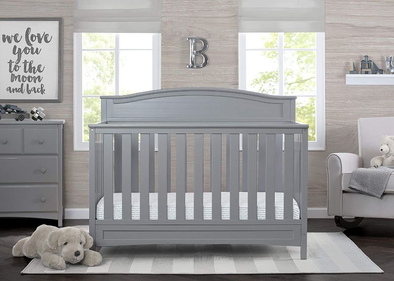 Photo 1 of Delta Children Emery Deluxe 6-in-1 Convertible Crib, Grey + Delta Children Twinkle Galaxy Dual Sided Recycled Fiber Core Crib 
