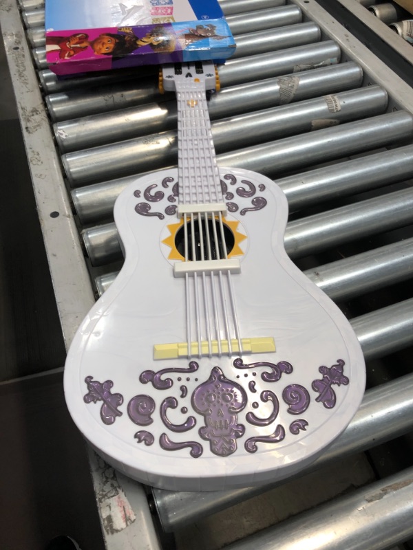 Photo 2 of 
Disney/Pixar Coco Guitar, Playable Musical Toy with Chord Chart, Approx 25-in (63.5-cm) Long for Kids Ages 3 Years Old & Up [Amazon Exclusive]