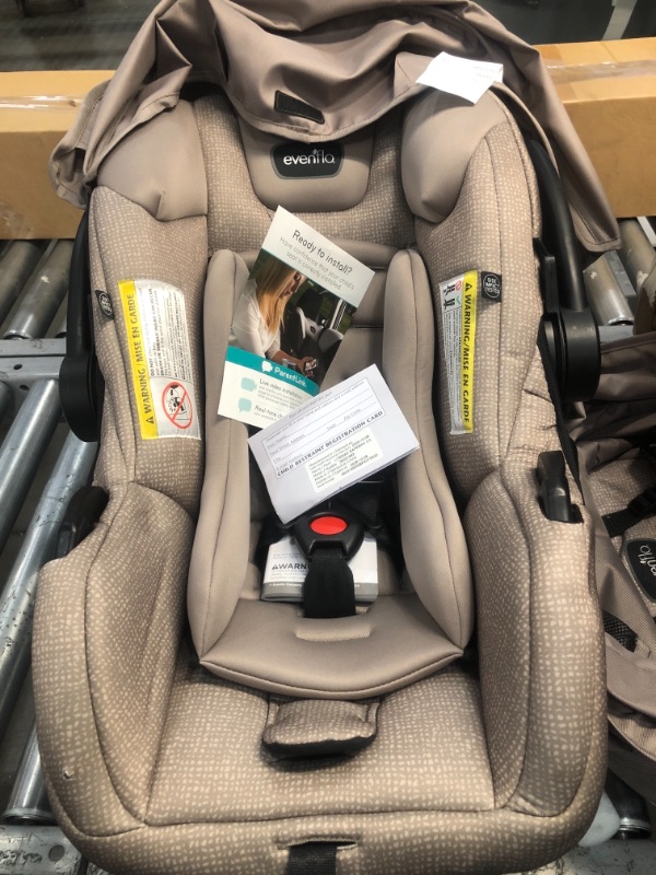 Photo 1 of Evenflo Pivot Modular Travel System with SafeMax Infant Car Seat - Sandstone
PREVIOUSLY OPENED AND USED