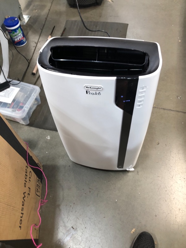 Photo 5 of NOT FUNCTIONAL SEE NOTES
De'Longhi 12000 BTU Portable Air Conditioner, Dehumidifier & Fan + Cool Surround Remote w/Built-in Temperature Control Sensor & Quiet Mode, 500 sq ft, Large Room, Pinguino 6800 BTU (DOE), White