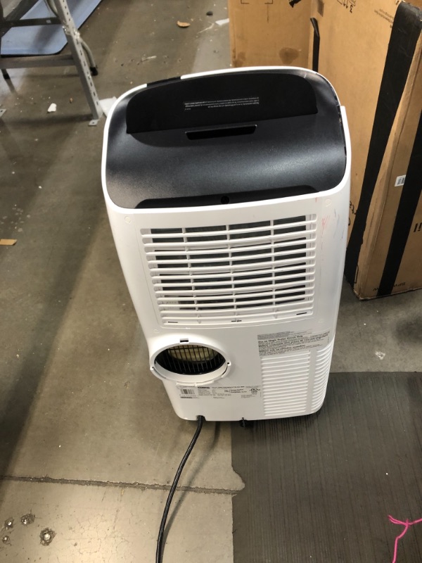 Photo 6 of NOT FUNCTIONAL SEE NOTES
De'Longhi 12000 BTU Portable Air Conditioner, Dehumidifier & Fan + Cool Surround Remote w/Built-in Temperature Control Sensor & Quiet Mode, 500 sq ft, Large Room, Pinguino 6800 BTU (DOE), White