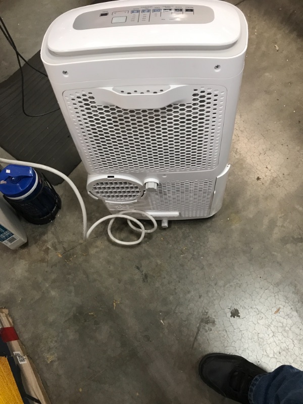 Photo 1 of MIDEA 3-in-1 Portable Air Conditioner, Dehumidifier, Fan, for Rooms up to 200 sq ft Enabled, 10,000 BTU DOE (5,800 BTU SACC) Control with Remote, Smartphone or Alexa
