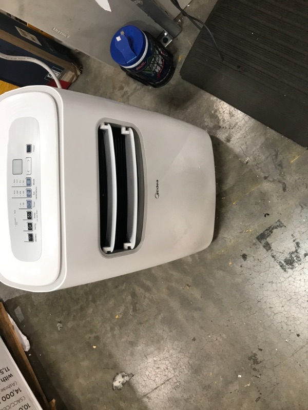 Photo 1 of MIDEA 3-in-1 Portable Air Conditioner, Dehumidifier, Fan, for Rooms up to 200 sq ft Enabled, 10,000 BTU DOE (5,800 BTU SACC) Control with Remote, Smartphone or Alexa
