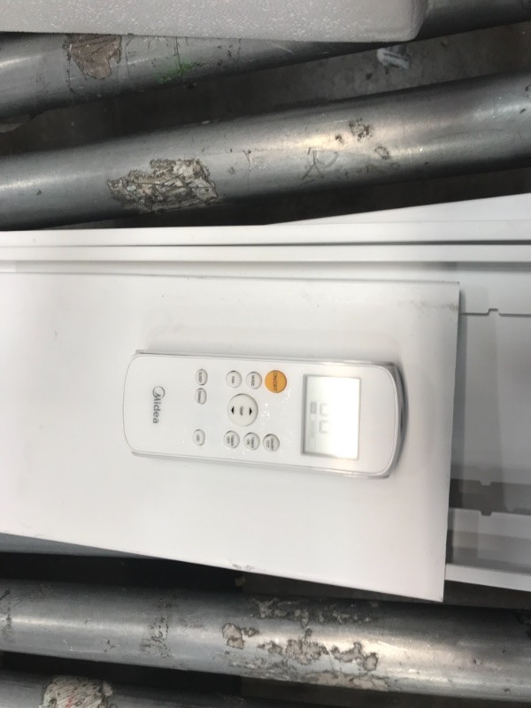 Photo 1 of MIDEA 3-in-1 Portable Air Conditioner, Dehumidifier, Fan, for Rooms up to 200 sq ft Enabled, 10,000 BTU DOE (5,800 BTU SACC) Control with Remote, Smartphone or Alexa

