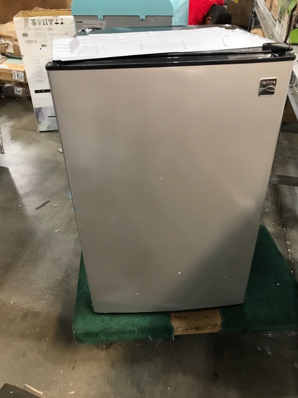 Photo 4 of **PARTS ONLY*** Kenmore 94293 44 cu ft Compact Refrigerator  Stainless Steel 
motor ripped out
