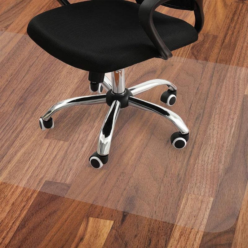 Photo 1 of Desk Chair Mat for Tile and Hardwood Floor, Floor Protector for Under Rolling Office Chair and Computer Table, Large 46 x 71 Inches