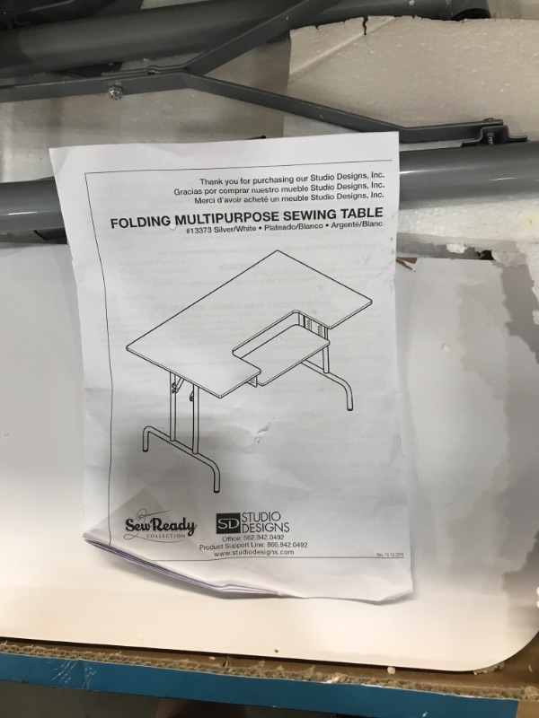 Photo 3 of Studio Designs 47.5” Laminate Folding Multipurpose Sewing Table White (13373)

//loose hardware