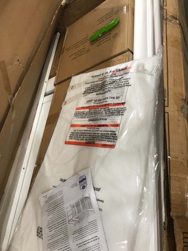 Photo 1 of Storkcraft Portofino 4-in-1 Convertible Crib and Changer - White