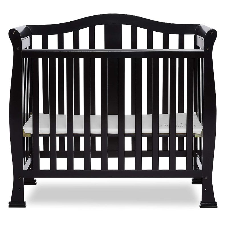 Photo 1 of NOT SAME BUT SIMILAR TO... Dream On Me Addison 4-in-1 Convertible Mini Crib in Black, Greenguard Gold Certified AS IS USED, MISSING/LOOSE HARDWARE, COSMETIC DAMAGE FROM PREVIOUS USE 
