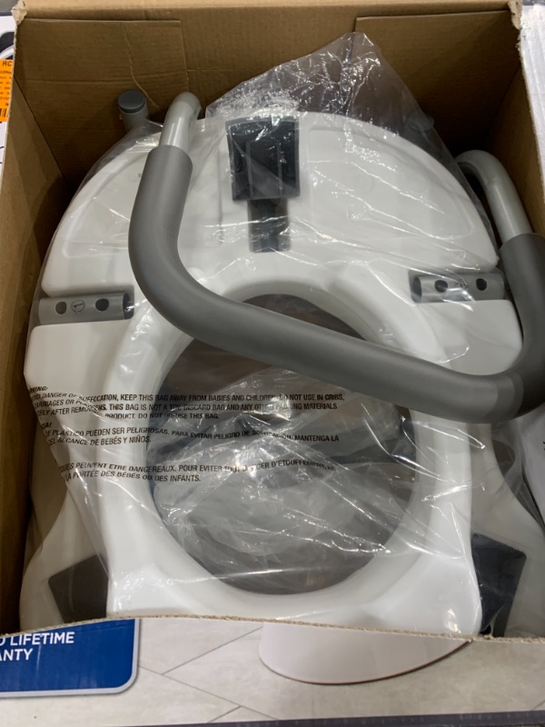 Photo 2 of E-Z Lock Raised Toilet Seat With Adjustable Armrests, 5 in.