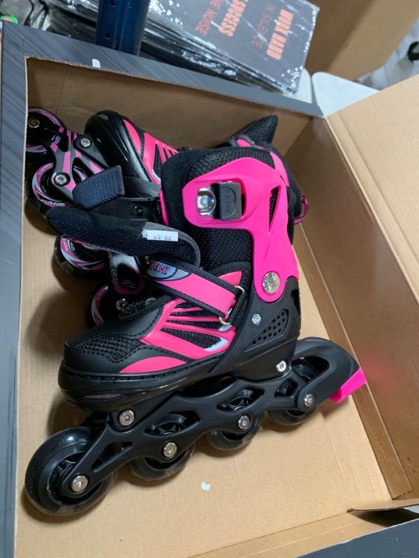 Photo 2 of DIKASHI Adjustable Inline Skates for Boys Girls,Blue/Black/Pink Roller Blades Skates for Kids Beginners with Light Up Wheels - SIZE SM
