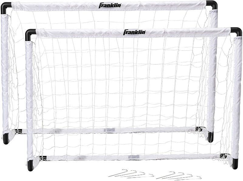 Photo 2 of Franklin Sports Kids Soccer Goal Set - Portable Backyard Youth Soccer Goals - 2 Mini Soccer Goals with Ground Stakes - 54" x 36" AS IS USED
