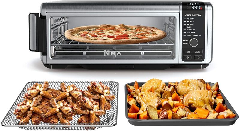 Photo 1 of **DAMAGED**
NINJA Foodi SP101/FT102CO Digital Fry, Convection Oven, Toaster, Air Fryer, Flip-Away for Storage, with XL Capacity, and a Stainless Steel Finish
