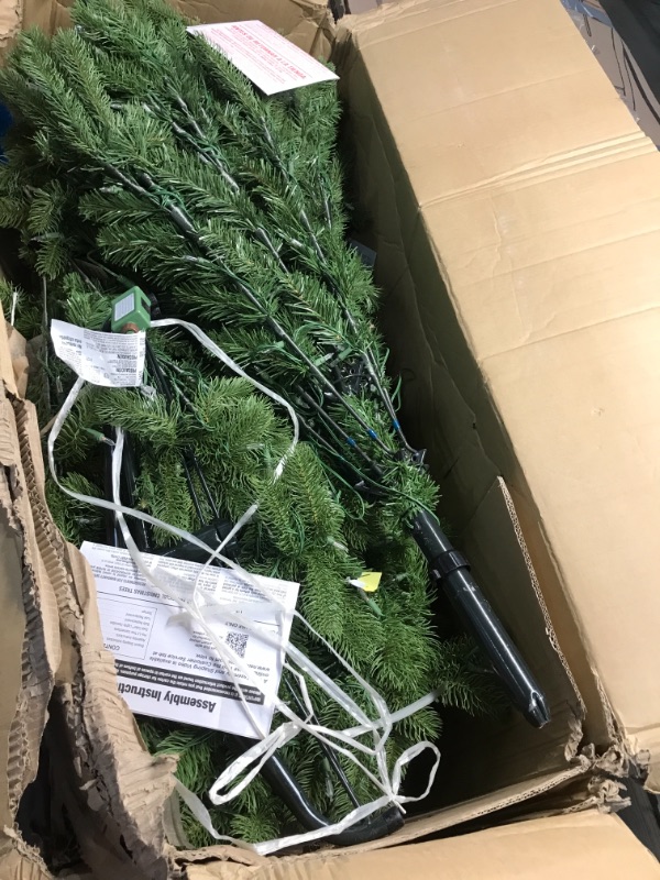 Photo 2 of (BULBS NOT FUNCTIONING)
National Tree Company Pre-Lit 'Feel Real' Artificial Full Downswept Christmas Tree, Green, Douglas Fir, Dual Color LED Lights, Includes PowerConnect and Stand, 7.5 Feet
