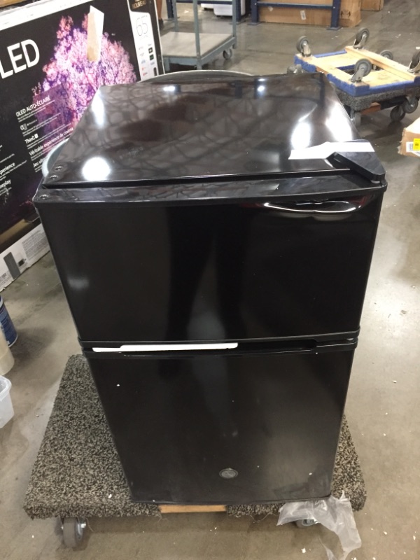 Photo 1 of GE Double-Door Mini Fridge, Freezer, 3.1 Cu Ft, Black, GDE03GGKBB Freestanding Compact Refrigerator
