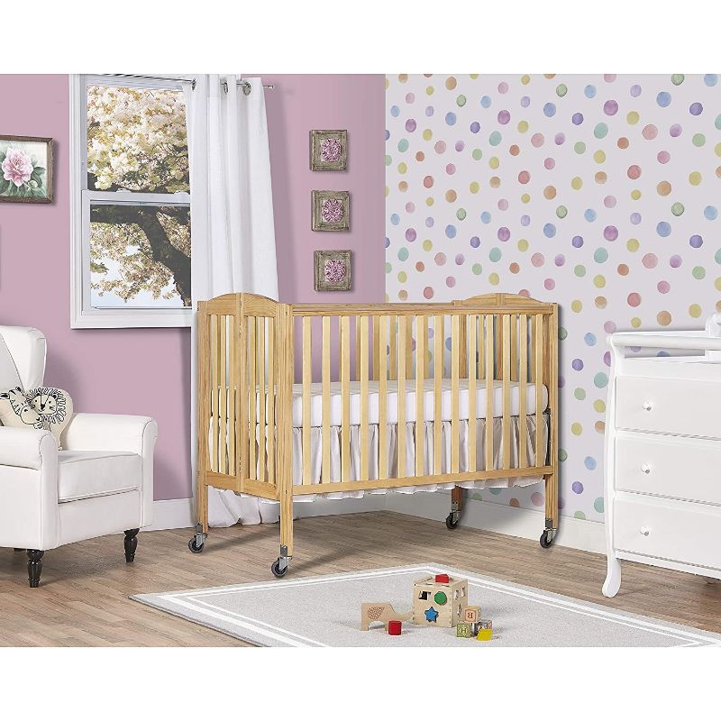 Photo 1 of Dream On Me Folding Portable Convenience Full-Size Crib, Natural