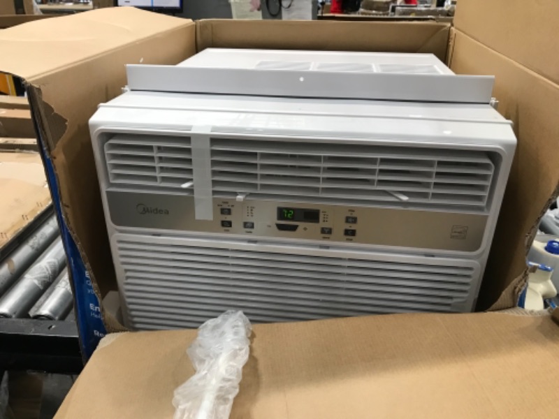Photo 2 of 
MIDEA 10,000 BTU EasyCool Window Air Conditioner, Fan-Cools, Circulates, and Dehumidifies Up to 450 Square Feet, Has A Reusable Filter, and Includes an LCD...