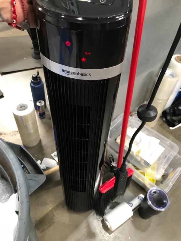 Photo 1 of Amazon Basics Oscillating 3 Speed Tower Fan with Remote
