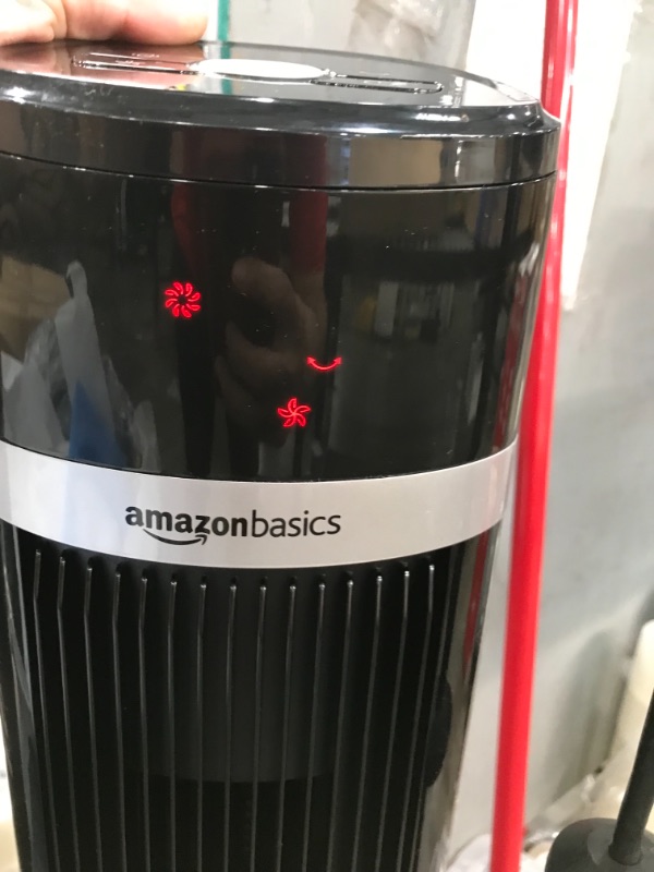 Photo 1 of Amazon Basics Oscillating 3 Speed Tower Fan with Remote
