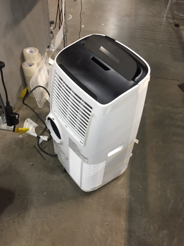 Photo 2 of De'Longhi 14000 BTU Portable Air Conditioner, Dehumidifier & Fan + Cool Surround Remote w/Built-in Temperature Control Sensor & Quiet Mode, 700 sq ft, XLarge Room, Pinguino 8600 BTU (DOE), White