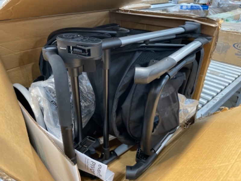 Photo 1 of Evenflo Pivot Xpand Modular Travel System with Safemax Infant Car Seat-Stallion