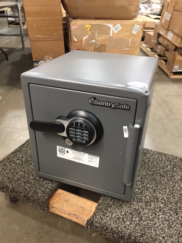 Photo 2 of *SEE last picture for damage*
*UNABLE to open, MISSING manual and keys* 
SentrySafe SFW123GDC Fireproof Waterproof Safe with Digital Keypad, 1.23 Cubic Feet, Gun Metal Gray
