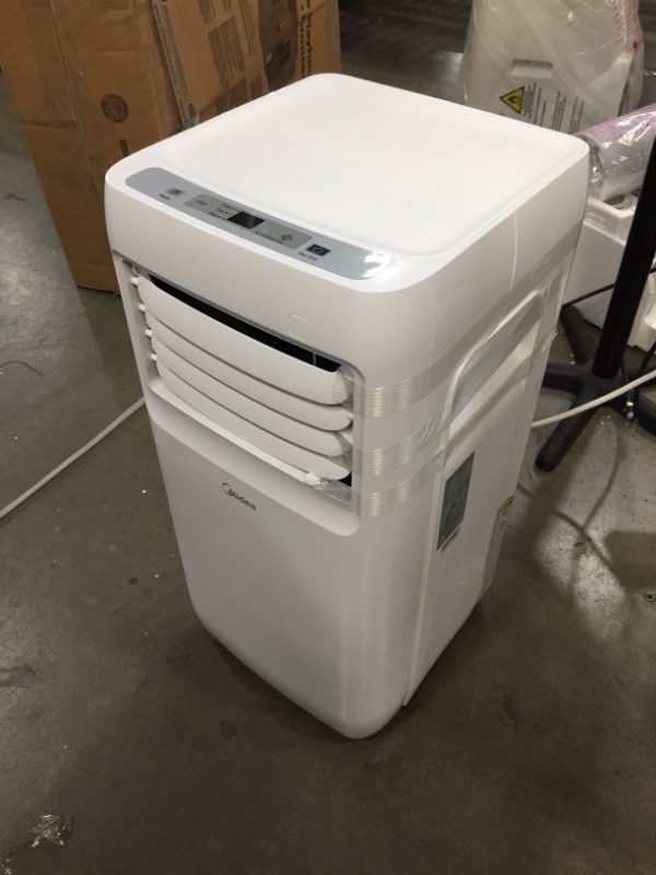 Photo 2 of MIDEA 3-in-1 Portable Air Conditioner, Dehumidifier, Fan, for Rooms up to 175 sq ft, White, 13 x 17.1 x 28.3 inches

