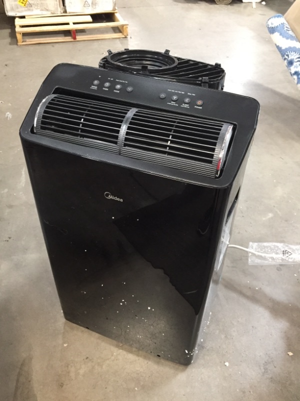 Photo 2 of *vent isn't straight, SEE last picture*
Midea Duo 12,000 BTU(10,000 BTU SACC)Ultra Quiet Smart HE Inverter Portable Air Conditioner, Dehumidifier, and Fan-Cools upto 450 sq.ft, Works with Alexa/Google Assistant Includes Remote Control, Black, 19.53 x 16.7