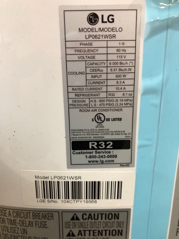 Photo 6 of *SEE last picture for damage*
LG 6,000 BTU (DOE) / 8,000 BTU (ASHRAE) Portable Air Conditioner, Cools 250 Sq.Ft. (10' x 25' room size), Quiet Operation, LCD Remote, Window Installation Kit Included, 115V
