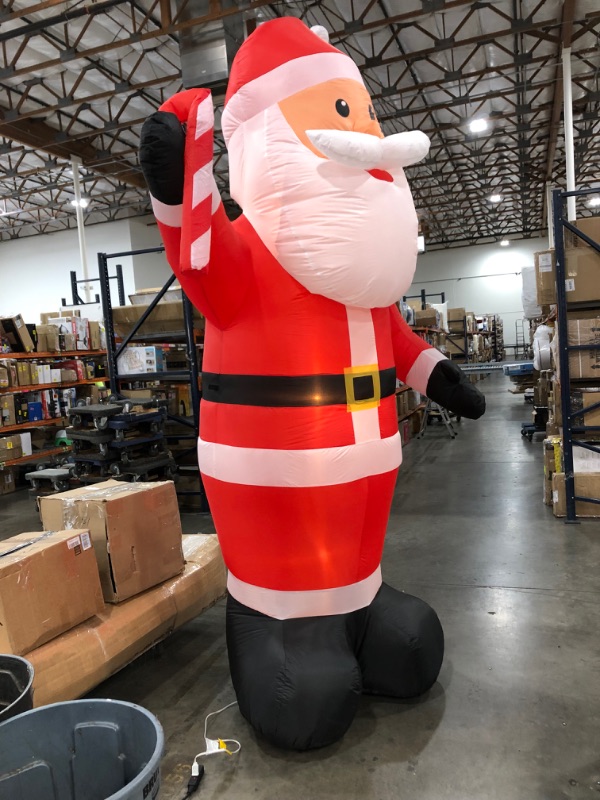 Photo 2 of Home Accents Holiday
11 ft. Airblown Santa with Candy Cane Christmas Inflatable