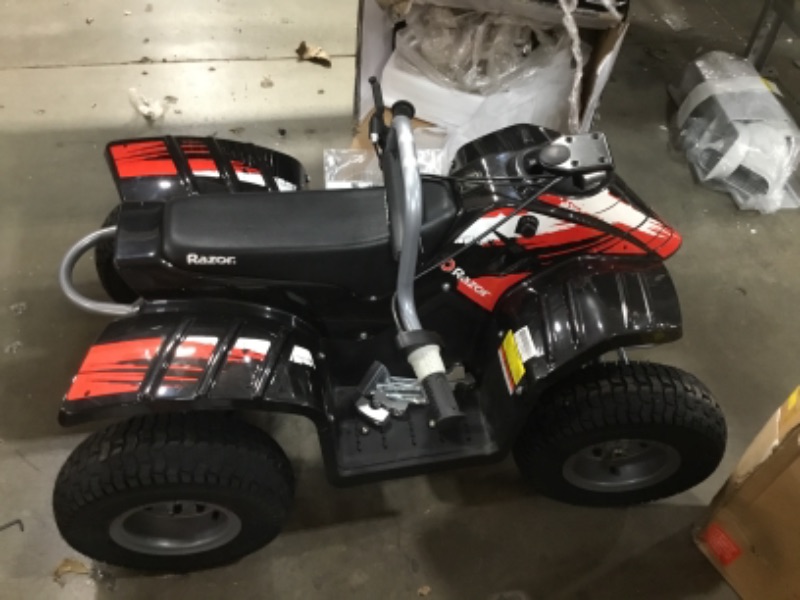Photo 1 of PARTS ONLY does not hold a charge, only lasts about 5 minutes from full charge
Razor Dirt Quad - 24V Electric 4-Wheeler ATV - Twist-Grip Variable-Speed Acceleration Control, Hand-Operated Disc Brake, 12" Knobby Air-Filled Tires 