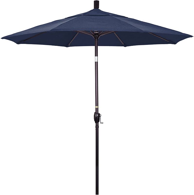 Photo 1 of 9 ft. Aluminum Auto Tilt Patio Umbrella in Navy Blue Olefin
