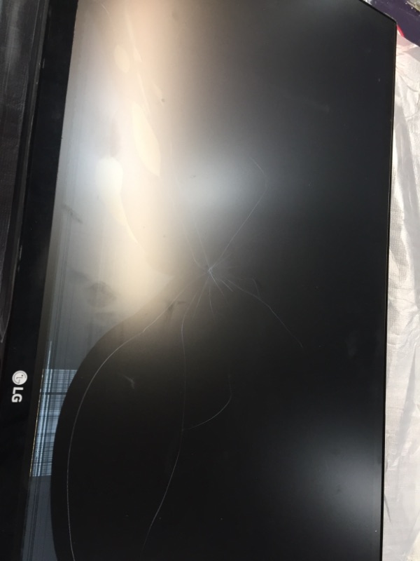 Photo 2 of LG 34UM68-P - 34" Class 21:9 UltraWide Full HD IPS LED Monitor (34" Diagonal)
**SCREEN IS DAMAGED BUT TURNS ON**