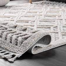 Photo 1 of Ansley Textured Lattice Tassel Beige 6 ft. 7 in. x 9 ft. Area Rug
