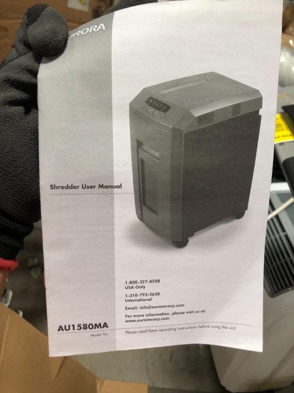Photo 4 of *tested item, shredded paper inside* 
Aurora AU1580MA Professional Grade High Security 15-Sheet Micro-Cut Paper/ CD and Credit Card Shredder, 60 Minutes Continuous Run time
