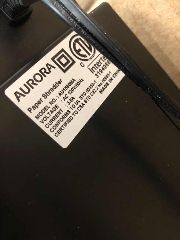 Photo 5 of *tested item, shredded paper inside* 
Aurora AU1580MA Professional Grade High Security 15-Sheet Micro-Cut Paper/ CD and Credit Card Shredder, 60 Minutes Continuous Run time
