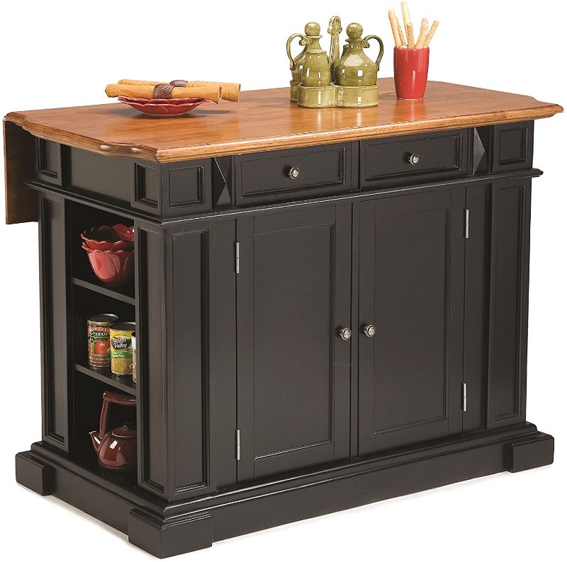 Photo 1 of *BOX 3 of 3, NOT COMPLETE* 
Homestyles Americana Kitchen Island with Wood Top and Drop Leaf Breakfast Bar, Storage with Drawers and Adjustable Shelves, 50 Inch Width, Black and Oak
