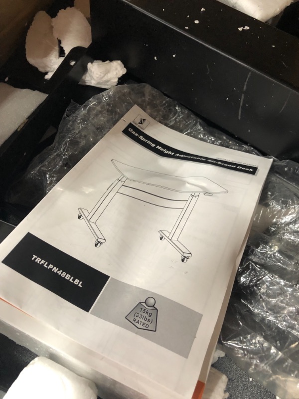 Photo 5 of *SEE last pictures for damage* 
*MISSING hardware* 
Stand Steady Tranzendesk Power 48 Inch Standing Desk Electric, Height Adjustable, Sit to Stand Up Workstation Quietly Go from Sitting to Standing w/Easy Tap Lever (27.5 x 47.5 / Black)
