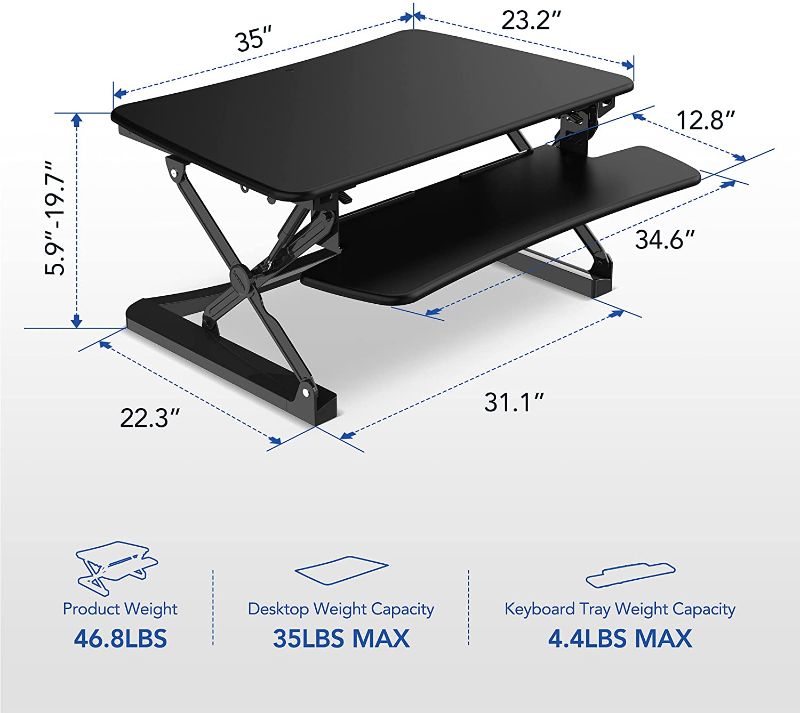 Photo 1 of FlexiSpot M2B Standing Desk Converter - 35 Inch wide platform Height Adjustable Stand up Desk Riser with Removable Keyboard Tray (Medium size Black)
