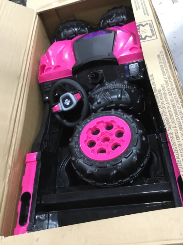 Photo 1 of Kid Trax Toddler UTV Electric Ride-On Toy, Kids 3-5 Years Old, 6 Volt Battery and Charger, Max Rider Weight 60 lbs, LED Headlights, Pink

