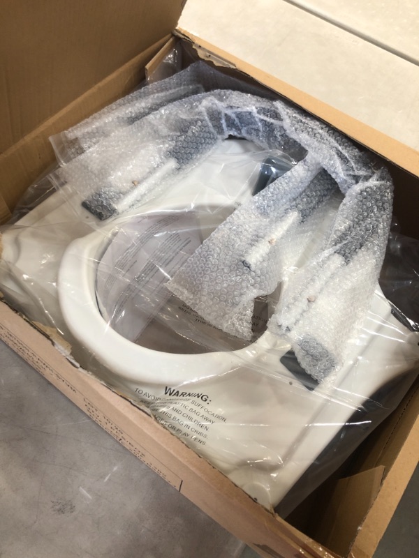 Photo 1 of Vaunn Medical Elevated Raised Toilet Seat & Commode Booster Seat Riser with Removable Padded Grab bar Handles & Locking Mechanism
