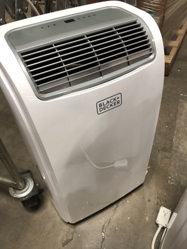 Photo 2 of *SEE last picture for damage* 
BLACK+DECKER BPACT08WT Portable Air Conditioner with Remote Control, 5,000 BTU DOE (8,000 BTU ASHRAE), Cools Up to 150 Square Feet, White
