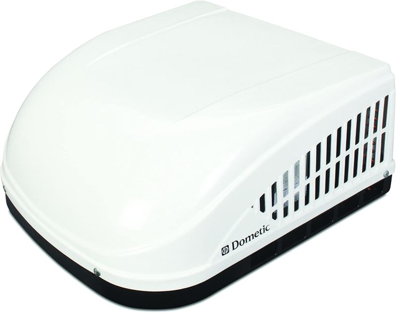 Photo 1 of *SEE last pictures for damage* 
Dometic Brisk II Evolution Standard Profile Rooftop Air Conditioner, 15,000 BTU - Polar White (NOT FUNCTIONAL PARTS ONLY)