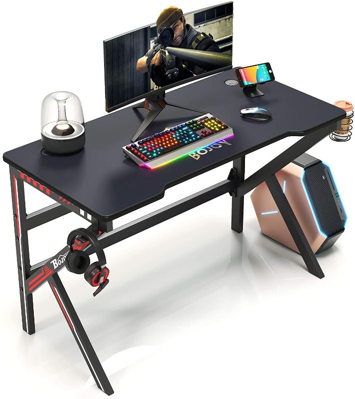 Photo 1 of BOJOY Gaming Desk 47 inch PC Computer Desk, Home Office Desk Gaming Table K Shaped Gamer Workstation with Full Mouse Pad and Cell Phone Stands, Black