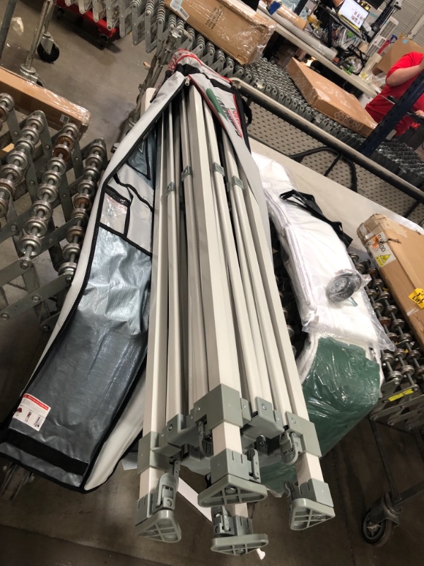 Photo 1 of Eurmax 10'x10' Ez Pop-up Canopy Tent Commercial Instant Canopies with 4 Removable Zipper End Side Walls and Roller Bag, Bonus 4 SandBags(White)