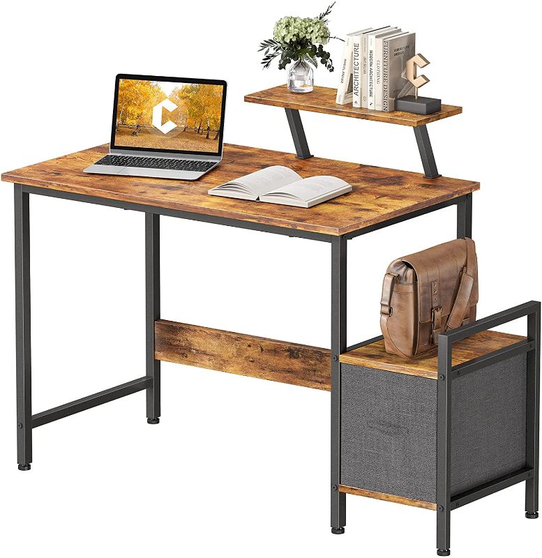 Photo 1 of CubiCubi Small Computer Desk 40 Inch Home Office Multipurpose Writing Desk with Extra Storage Rack and Moveable Shelf,Rustic Brown
