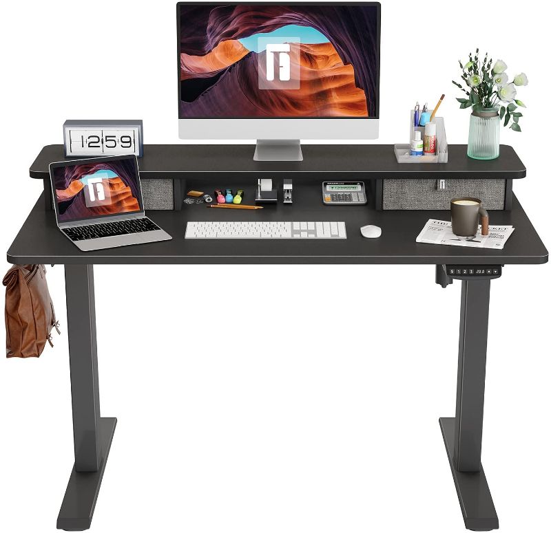 Photo 1 of FEZIBO Height Adjustable Electric Standing Desk with Double Drawer, 48 x 24 Inch Stand Up Table with Storage Shelf, Sit Stand Desk with Splice Board, Black Frame/Black Top
