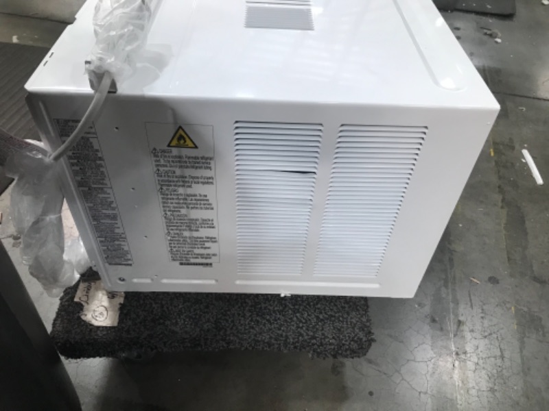 Photo 1 of LG 10,000 BTU 115V Window-Mounted Air Conditioner with Remote Control, White
