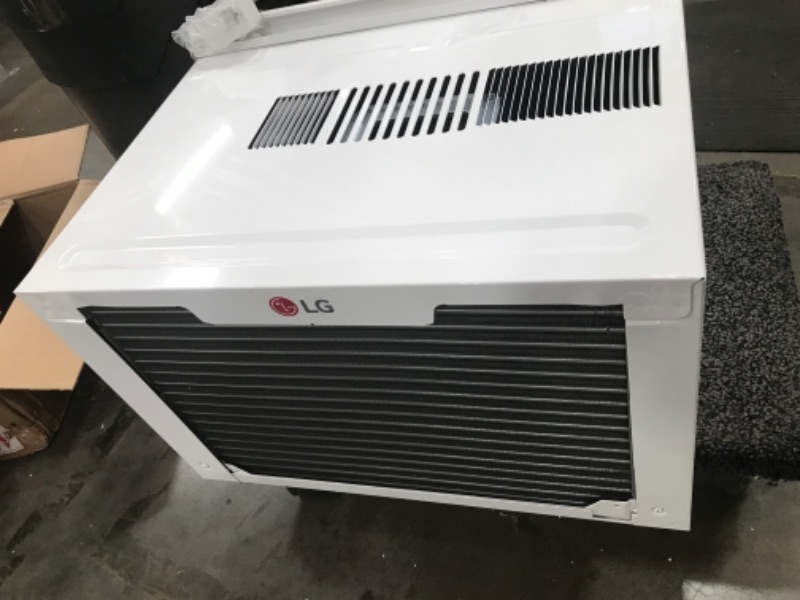 Photo 1 of LG 10,000 BTU 115V Window-Mounted Air Conditioner with Remote Control, White
