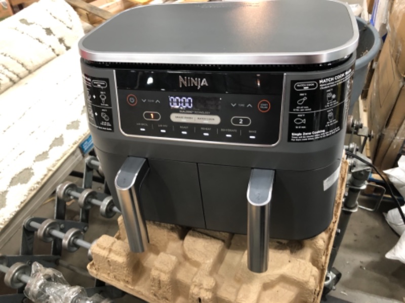 Photo 2 of Ninja DZ201 Air Fryer Foodi 6-in-1 8 Quart DualZone Technology, with 2 Crisper Plates 2 Independent Baskets, for Quick Easy Meals, Dark Grey Stainless Finish